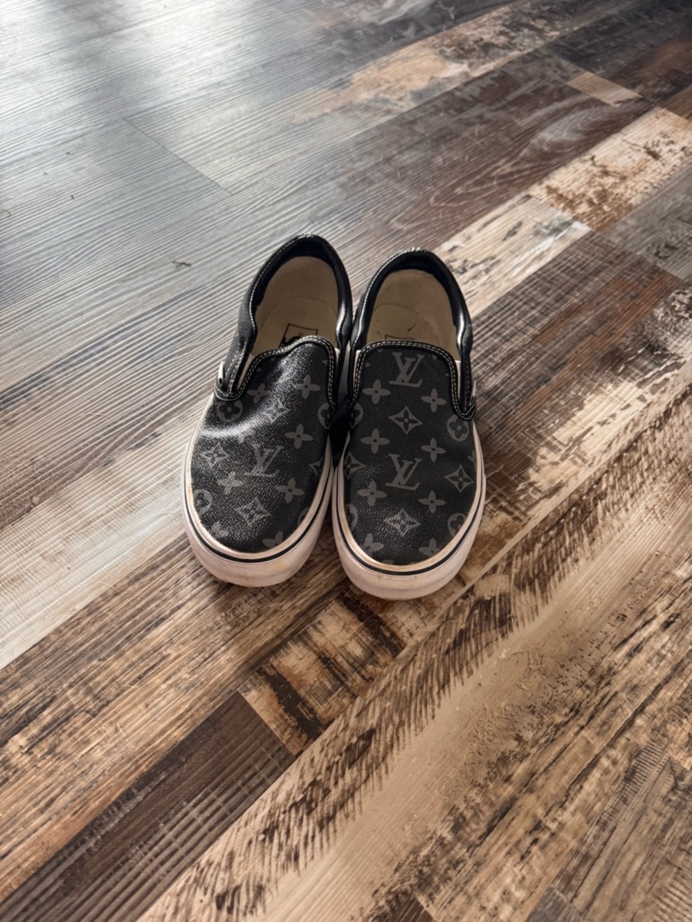 Vans Black Slip-On Sneakers with Monogram Pattern